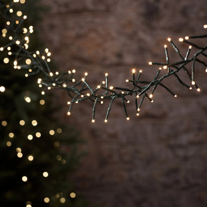 10m 1000 LED Warm White Outdoor Cluster Fairy Lights on Green Cable
