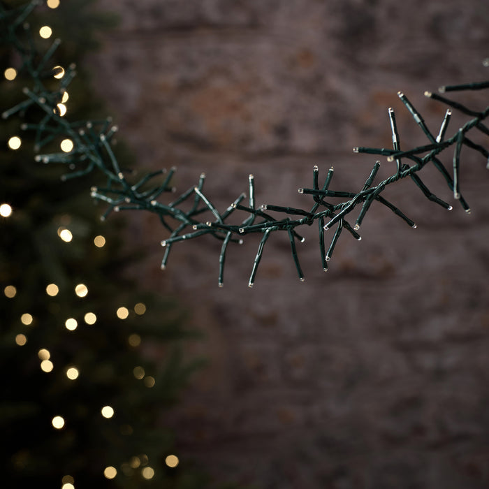 10m 1000 LED Warm White Outdoor Cluster Fairy Lights on Green Cable