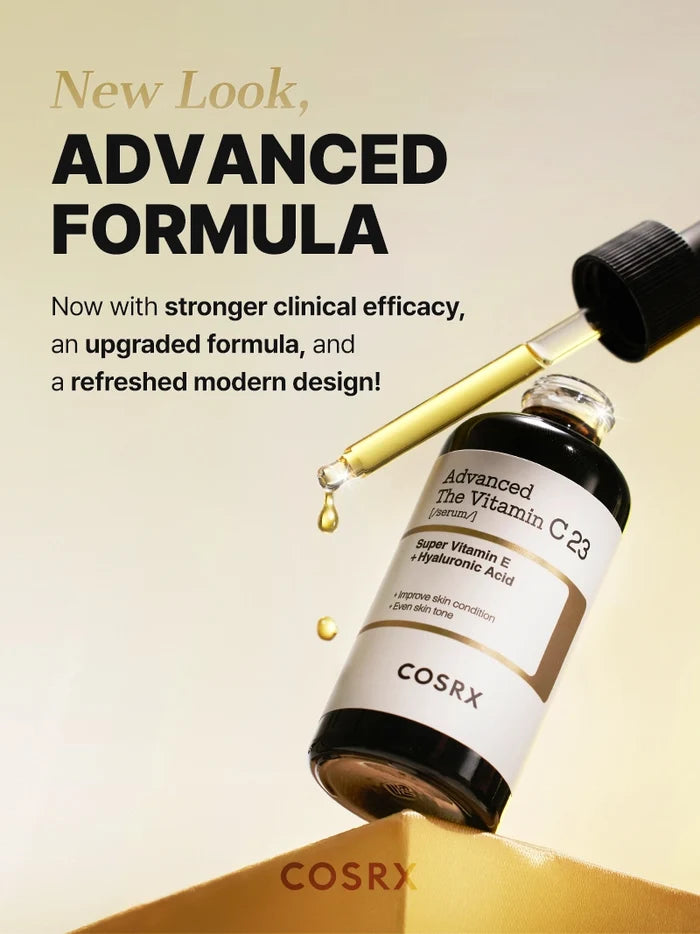 Updated COSRX Advanced The Vitamin C 23 Serum dropper shown releasing golden drops; upgraded dual-layer formula with Super Vitamin E and Hyaluronic Acid offers stronger clinical efficacy, brightening dark spots, and smoothing rough texture for luminous, even skin tone.