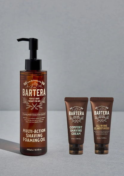 Bartera grooming products including a bottle of multi-action shaving foaming oil and two tubes of cream on a gray background.