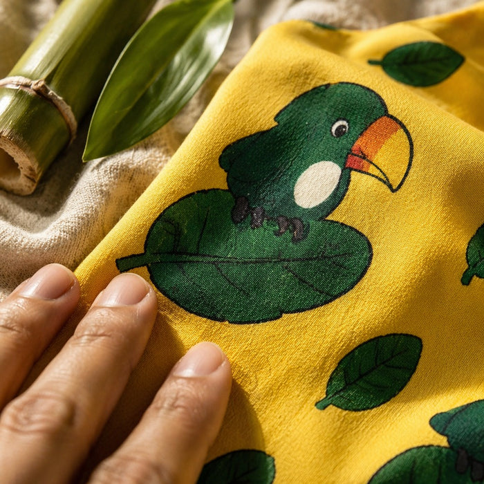 Mimi Baby Bib | Toucan & Leaf | Tropicale | Bamboo-Cotton, Waterproof, Tagless | 0-4Y