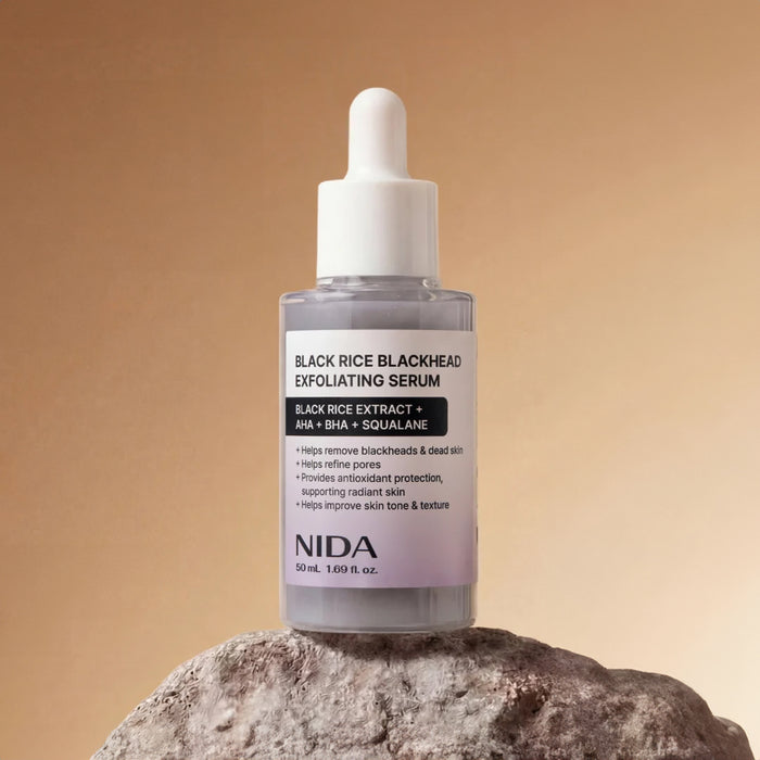 NIDA Black Rice Blackhead Exfoliating Serum - šveičiamasis veido serumas