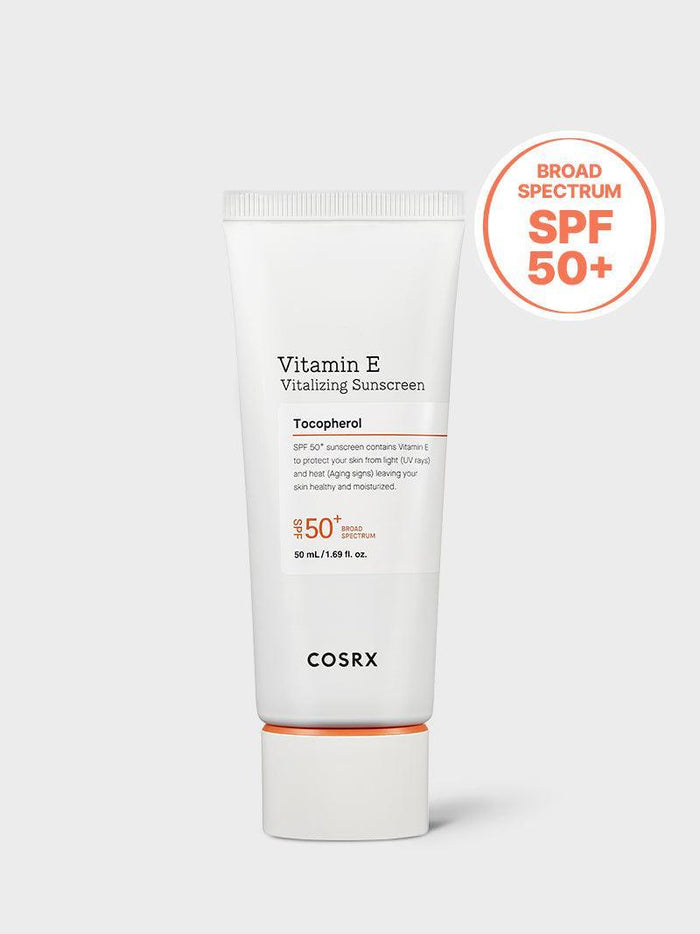COSRX Vitamin E Vitalizing Sunscreen SPF 50+ shown in clean product shot with broad-spectrum SPF 50+ badge; a lightweight Korean sunscreen enriched with vitamin E (tocopherol) that defends against UV damage, hydrates skin, and leaves a natural finish under makeup without white cast.