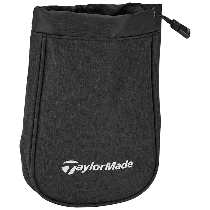 TaylorMade Performance Valuables Pouch N8949501 A black fabric golf pouch holds its shape with a drawstring top designed to secure items inside featuring the TaylorMade logo prominently displayed on the front.