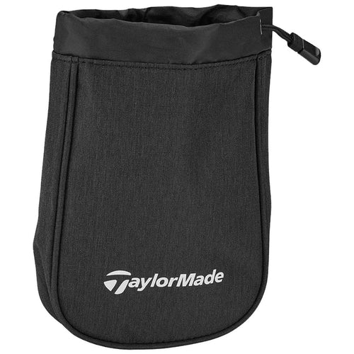 TaylorMade Performance Valuables Pouch N8949501 A black fabric golf pouch holds its shape with a drawstring top designed to secure items inside featuring the TaylorMade logo prominently displayed on the front.